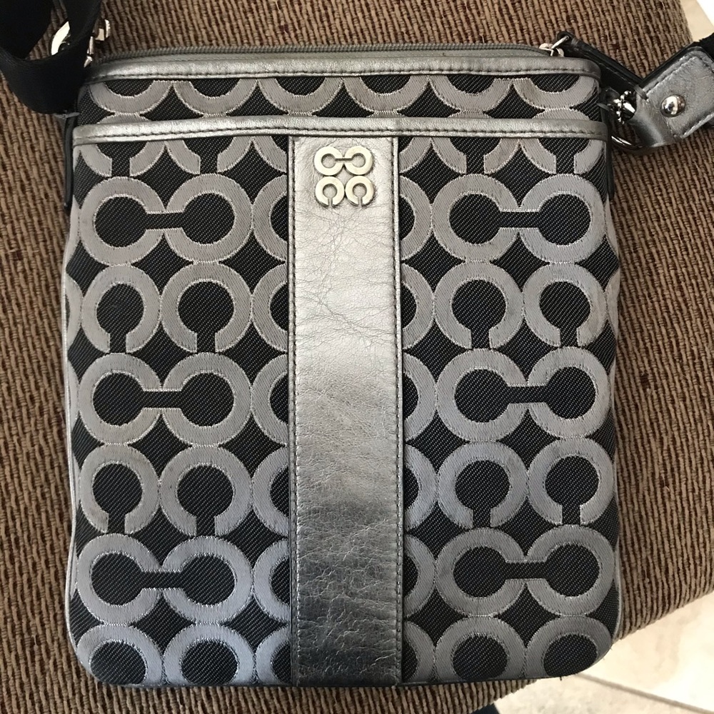 Navy and silver Coach crossbody bag